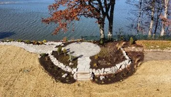 Aerial view of patio near lake.