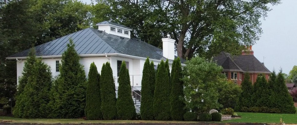 Landscaping on a house in Huron, OH, with hedges and plants.
