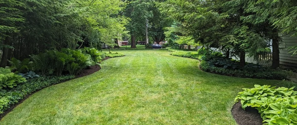 Softscapes with a green lawn and new plantings in Huron, OH.