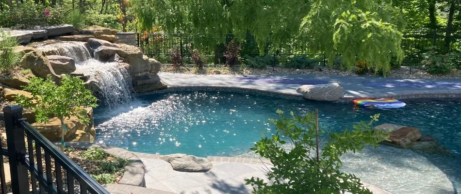 Swimming pool in Port Clinton, OH, with water feature.