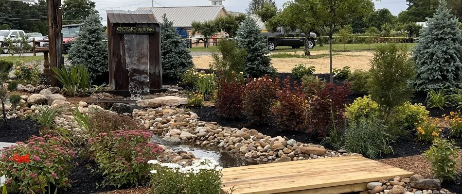 Water feature in Huron, OH, surrounded by flowers.